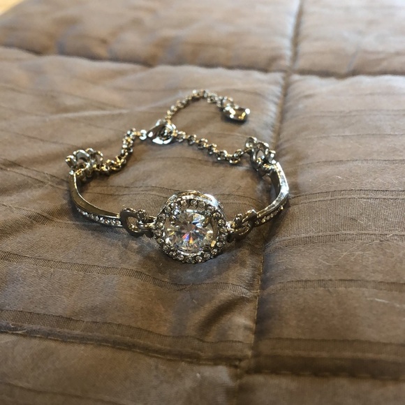 Jewelry - Rhinestone center stone silver tone bracelet. Well made channel set detail